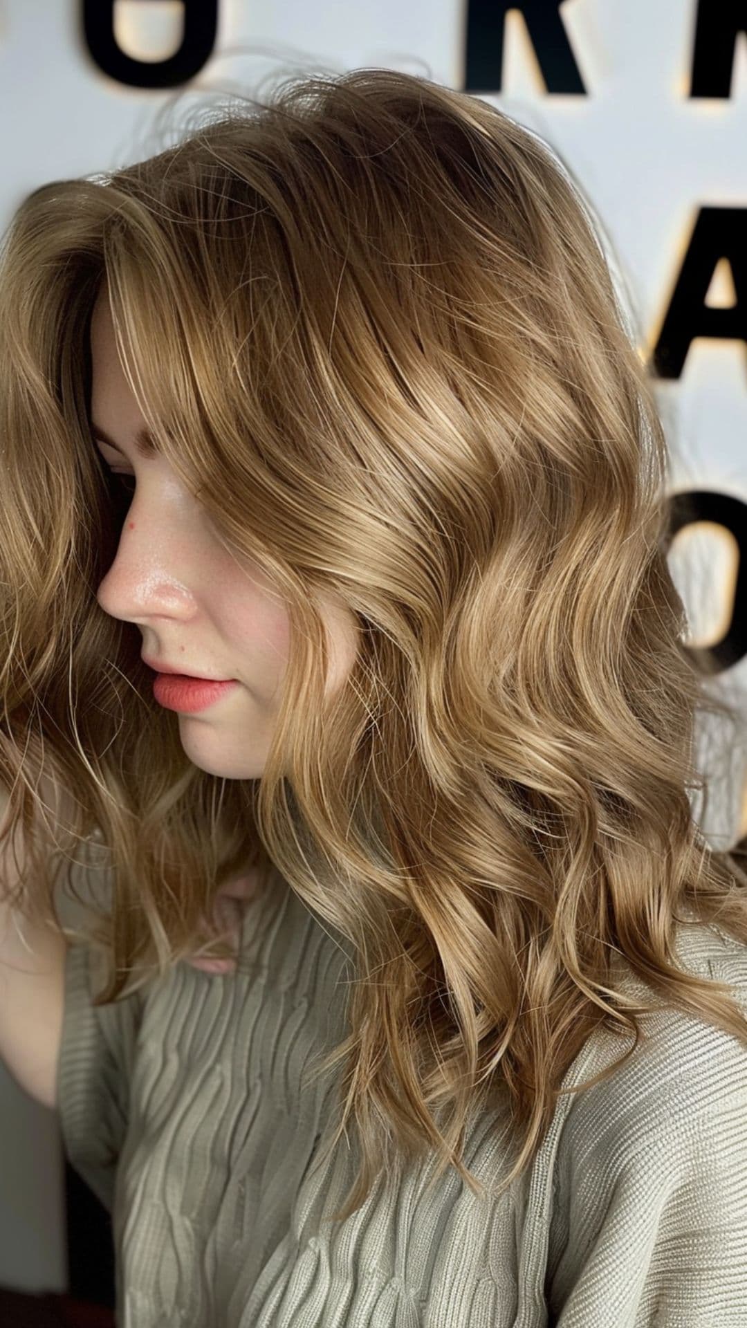 A woman modelling a golden brown hair.