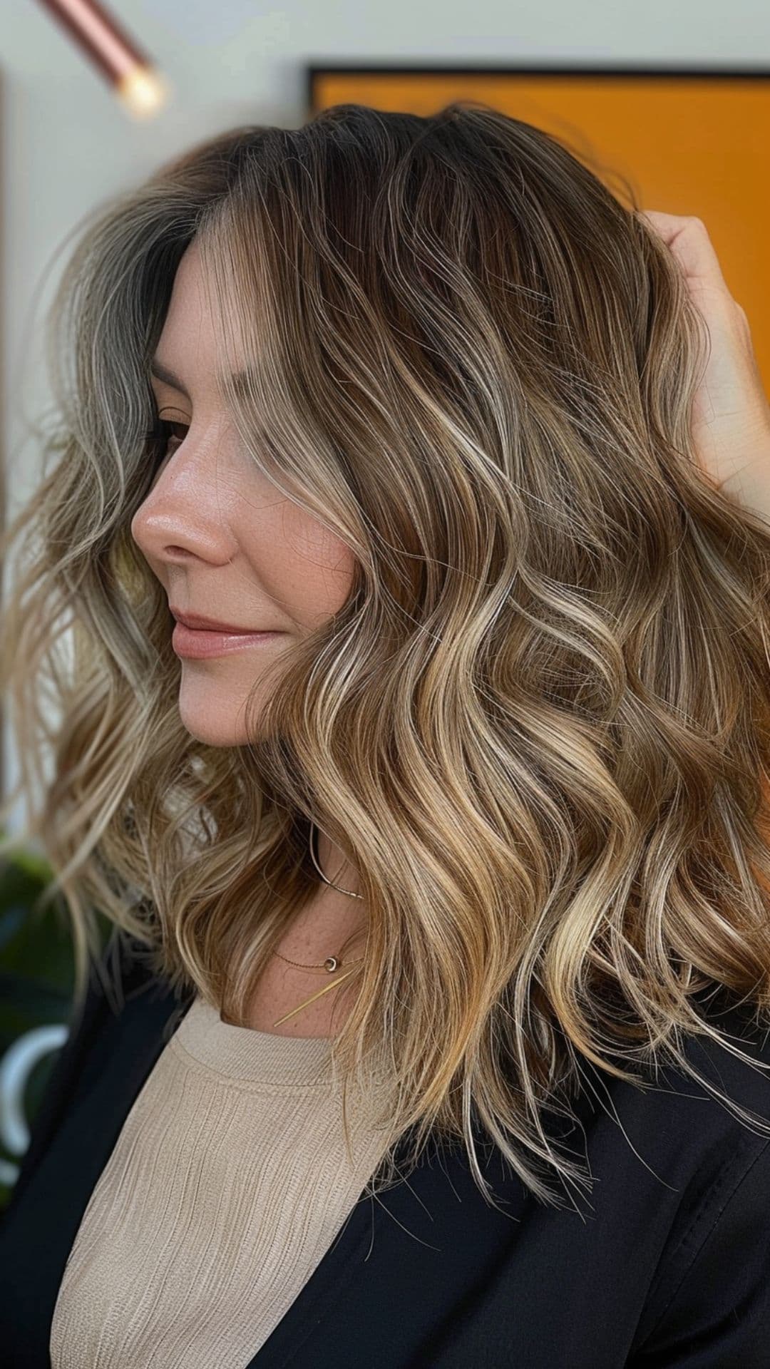 An old woman modelling a beach blonde wavy hair.