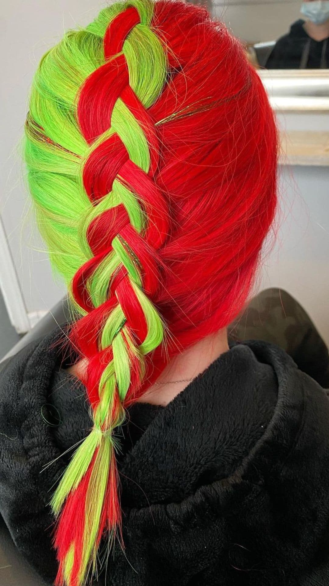 A woman modelling a Cherry Red and Neon Green Hair hairstyle.