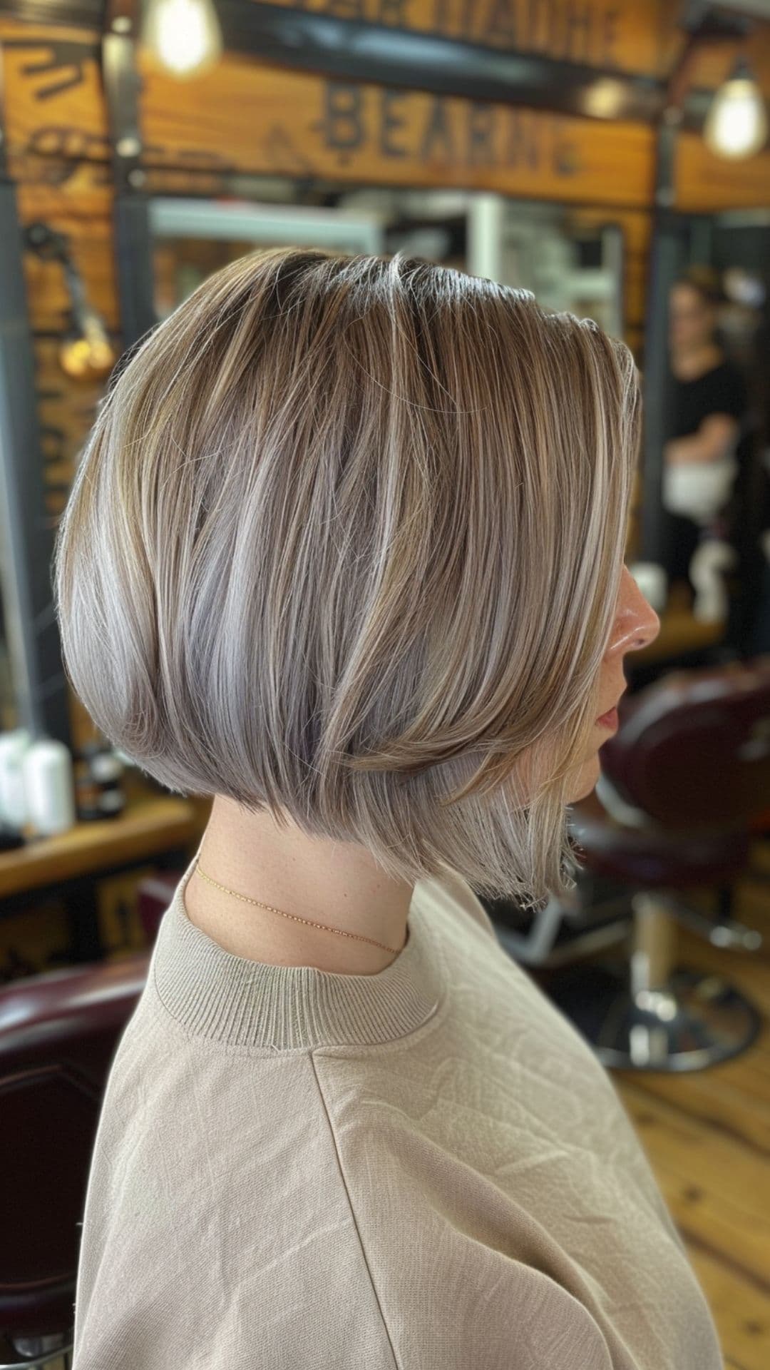 A woman modelling a classic inverted bob.