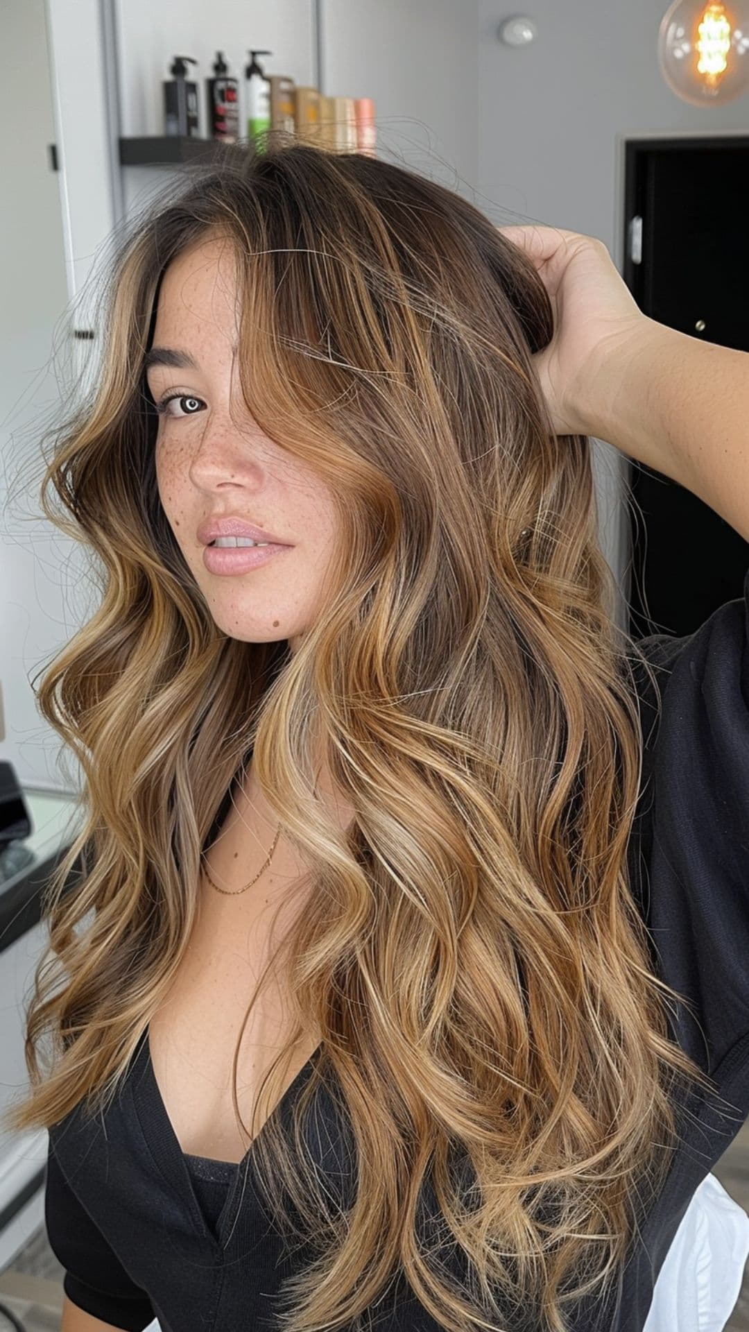 A woman modelling a golden bronze hair.