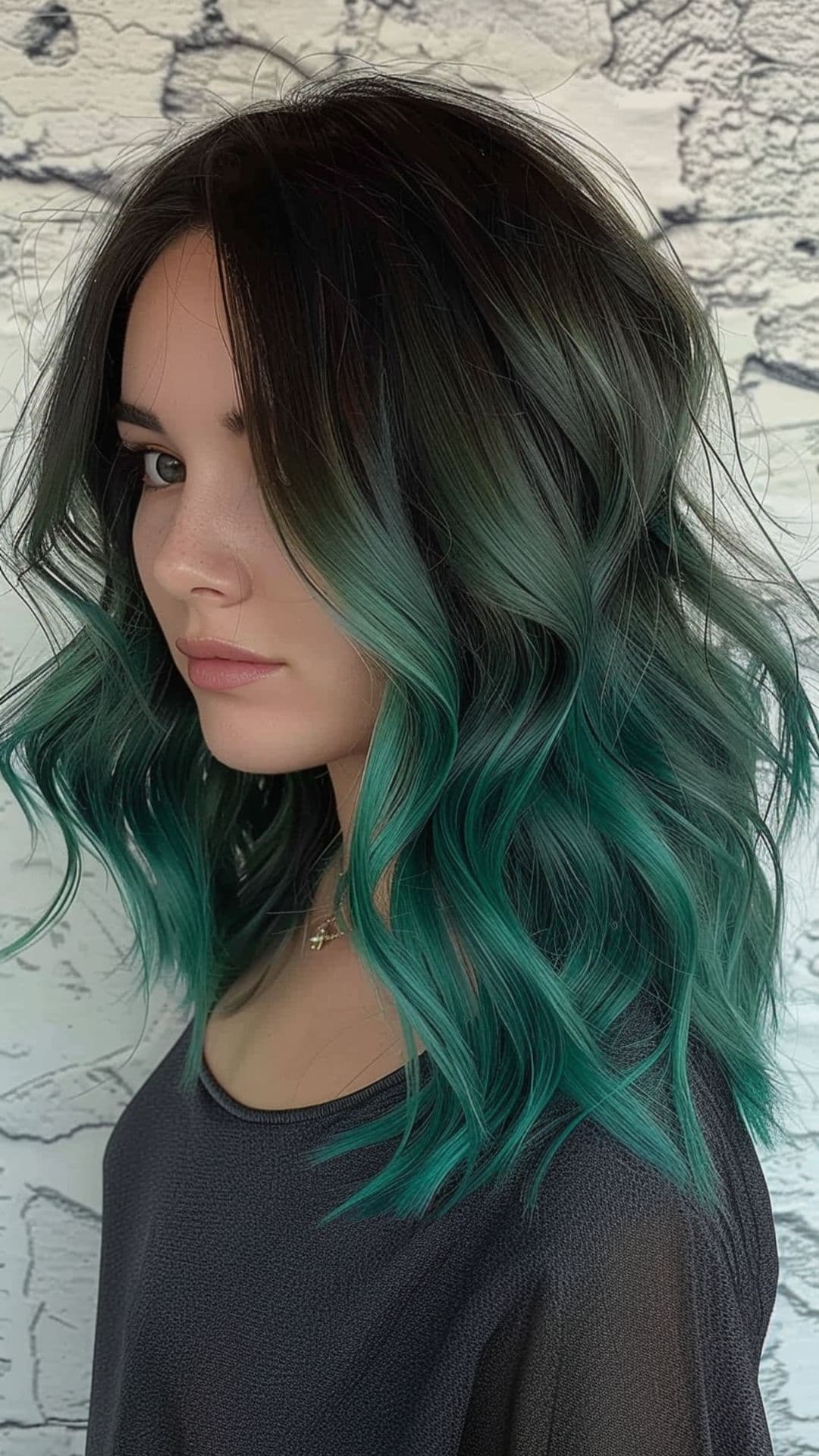 A woman modelling a green ombre.