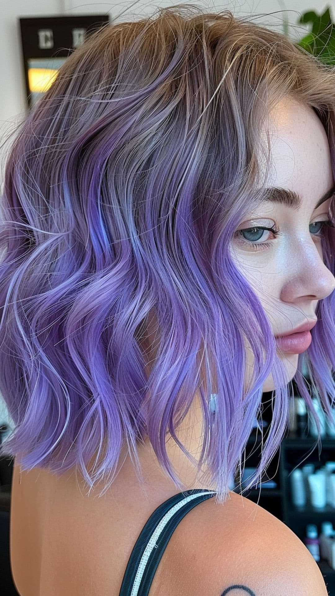 A woman modelling a short lavender ombre.