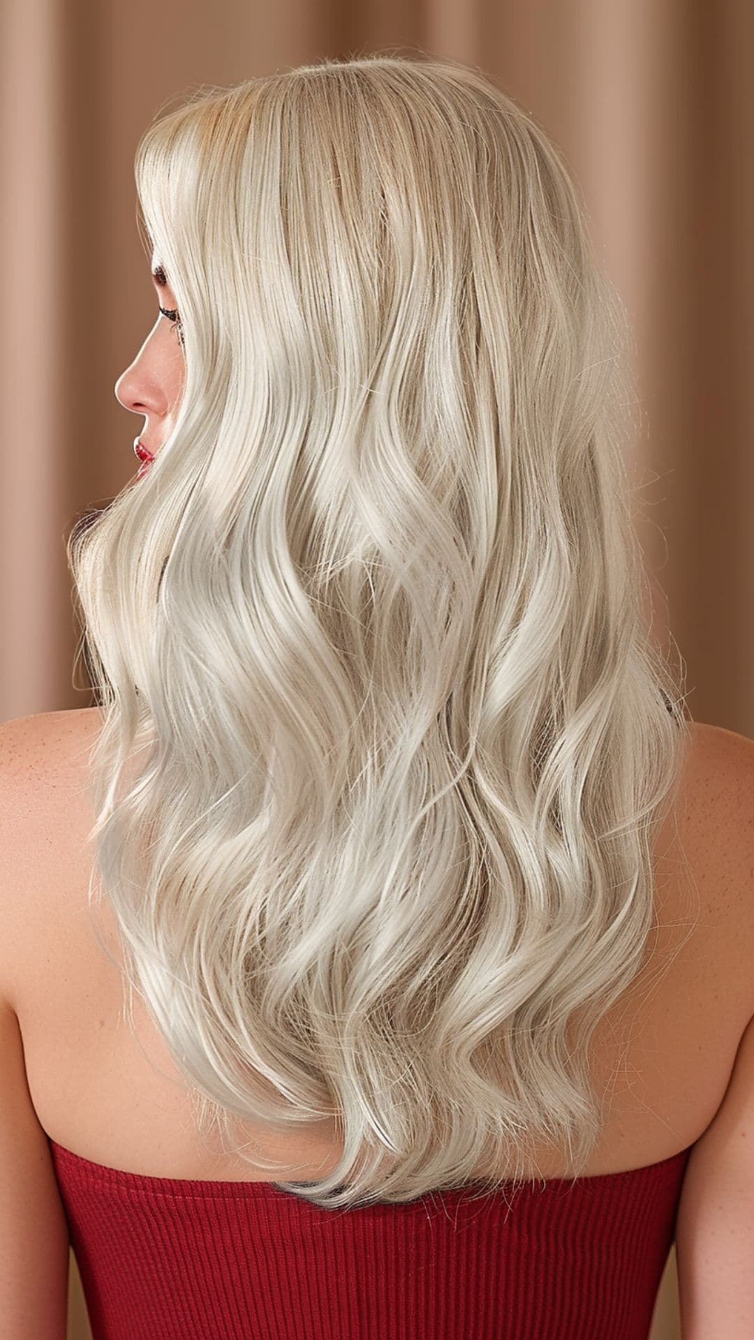 A woman modelling a platinum ash blonde hair.