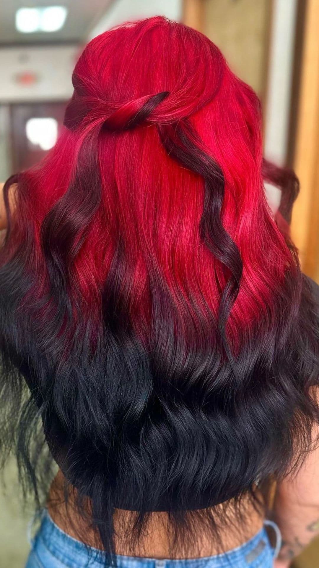 A woman modelling a red to black ombre.