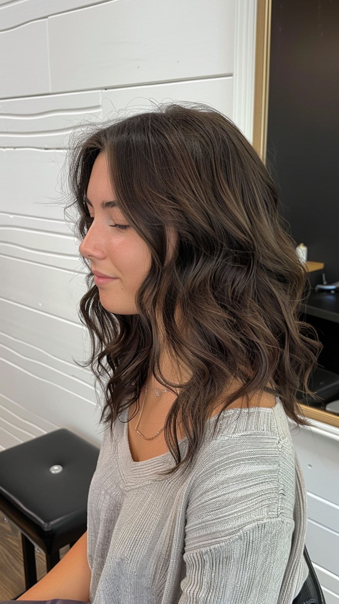 A woman modelling a rich espresso brown hair.