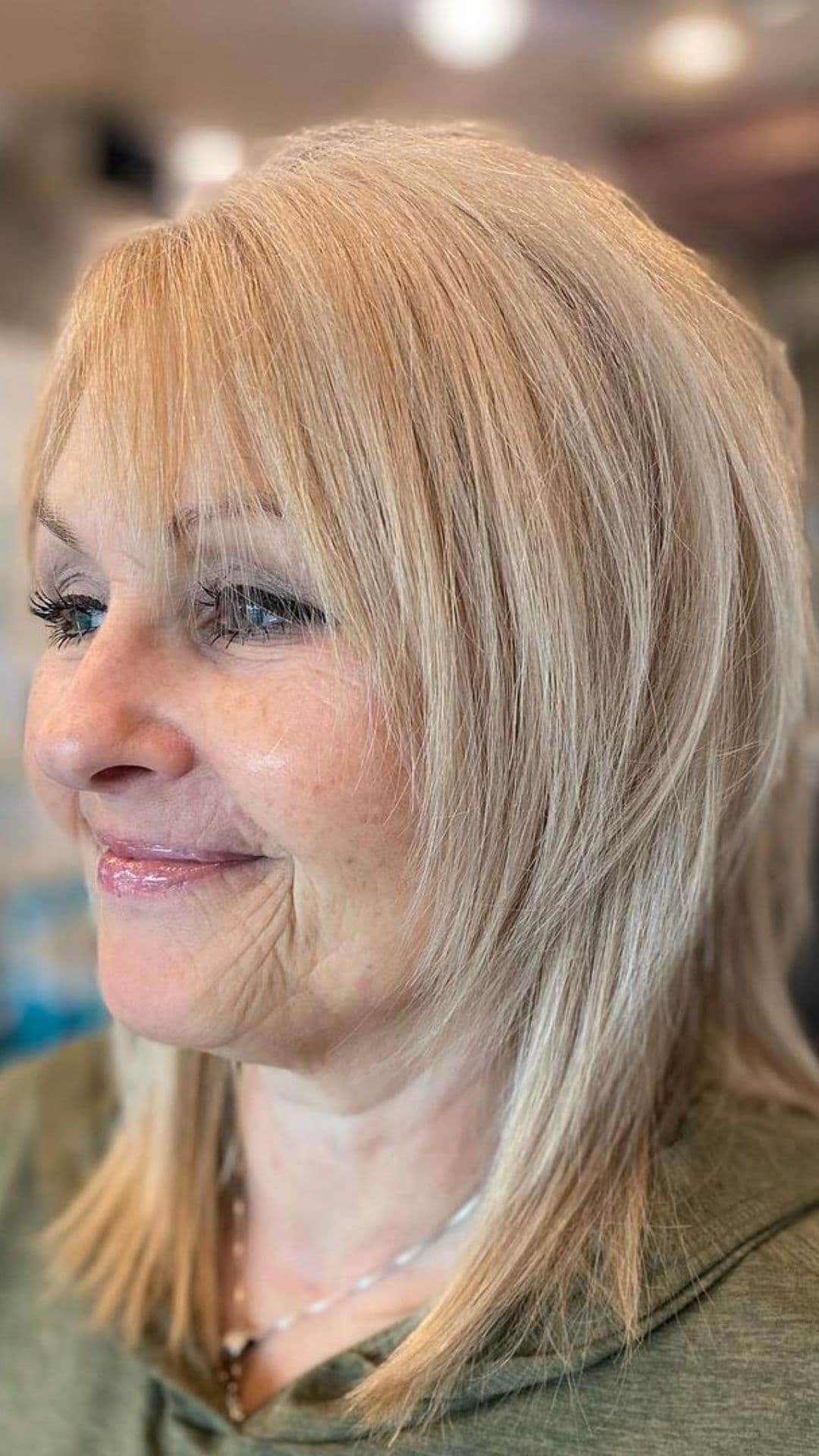 An older woman modelling the modern shag hairstyle.