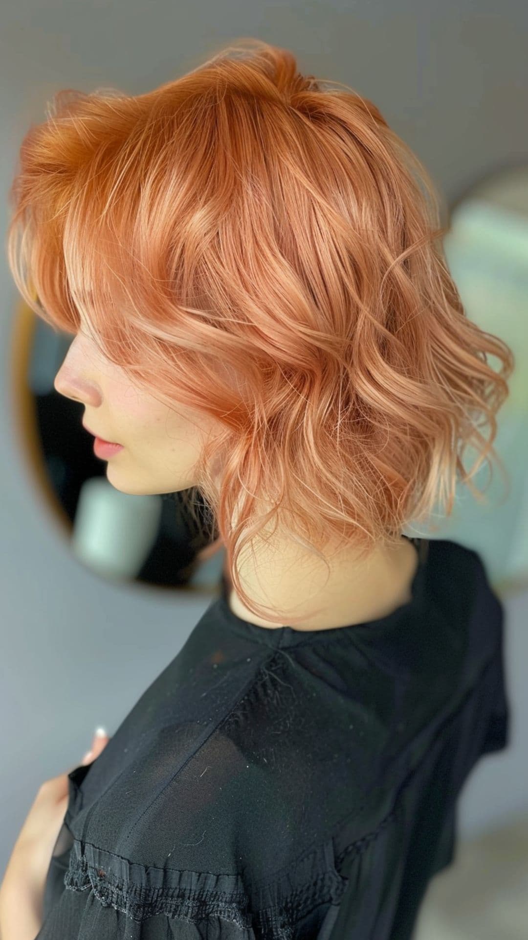 A woman modelling a peach hair.